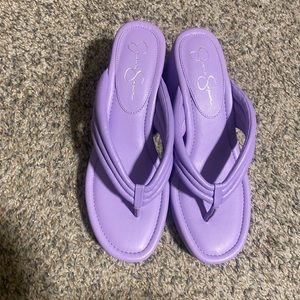 Brand New Purple wedge flip flops size 10